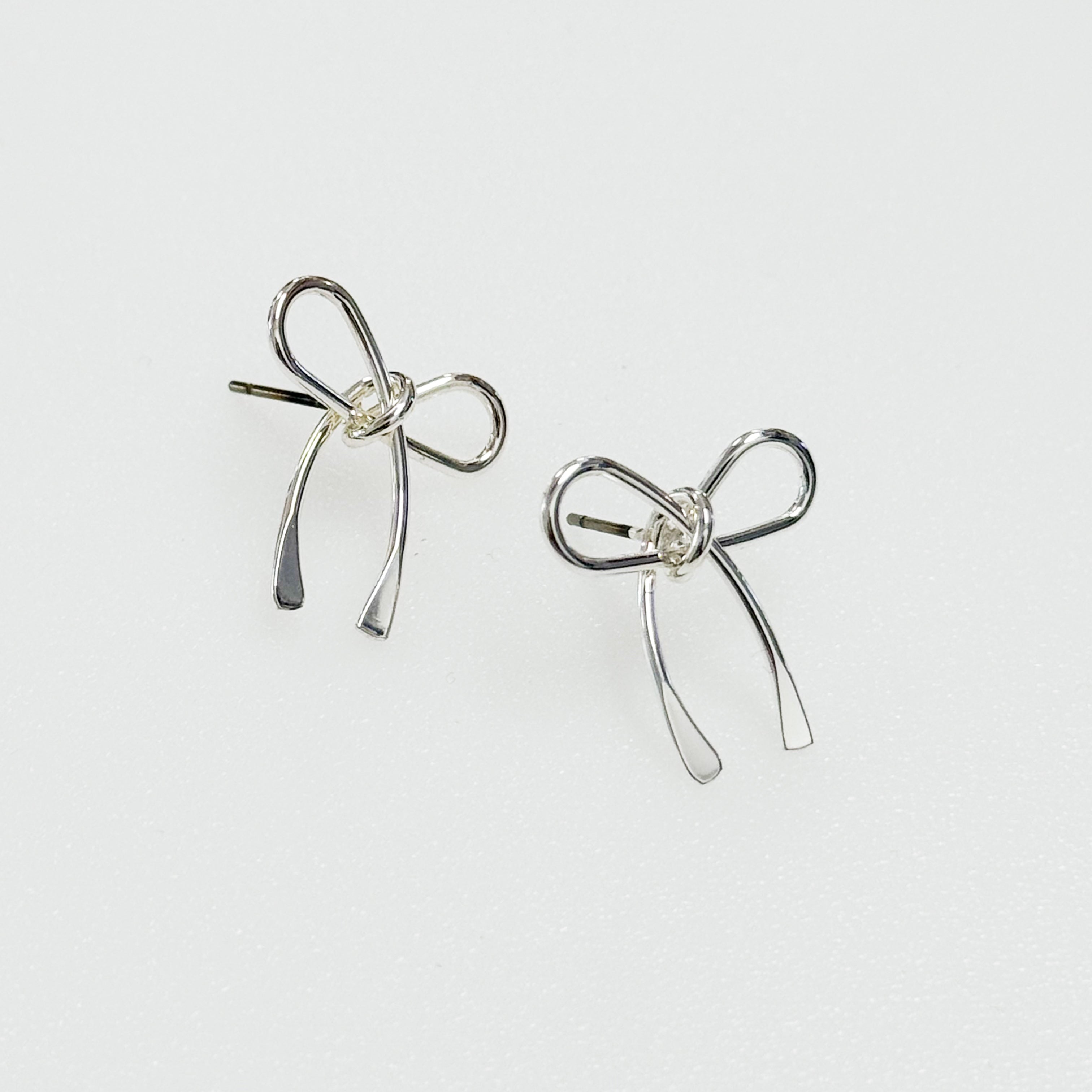 Samara - Dainty Silver Bow Stud Earrings