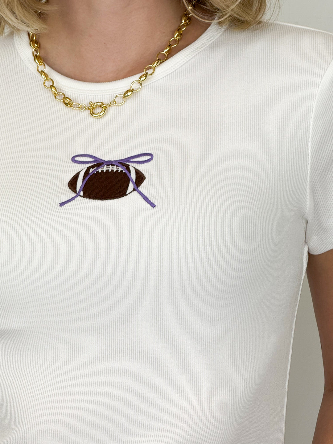 Leslie - Football Tee with Purple Bow
