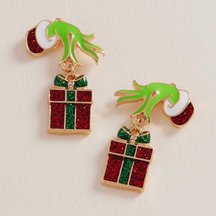 Grinch Hand Holding Red Present