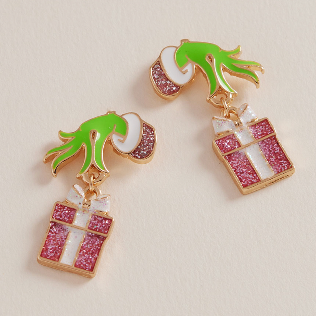 Grinch Hand Holding Pink Present