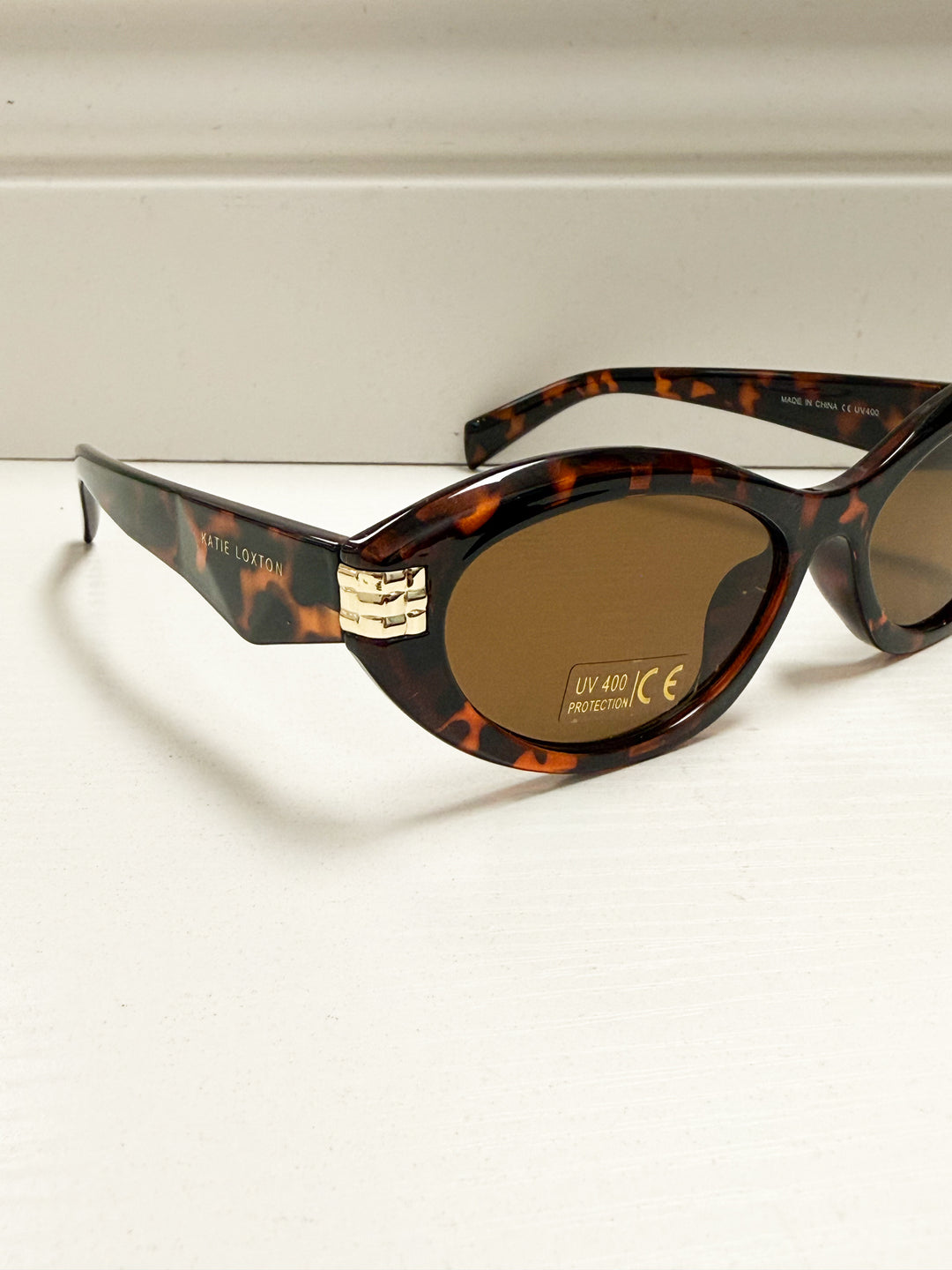 Katie Loxton - Bordeaux Slim Oval Sunglasses