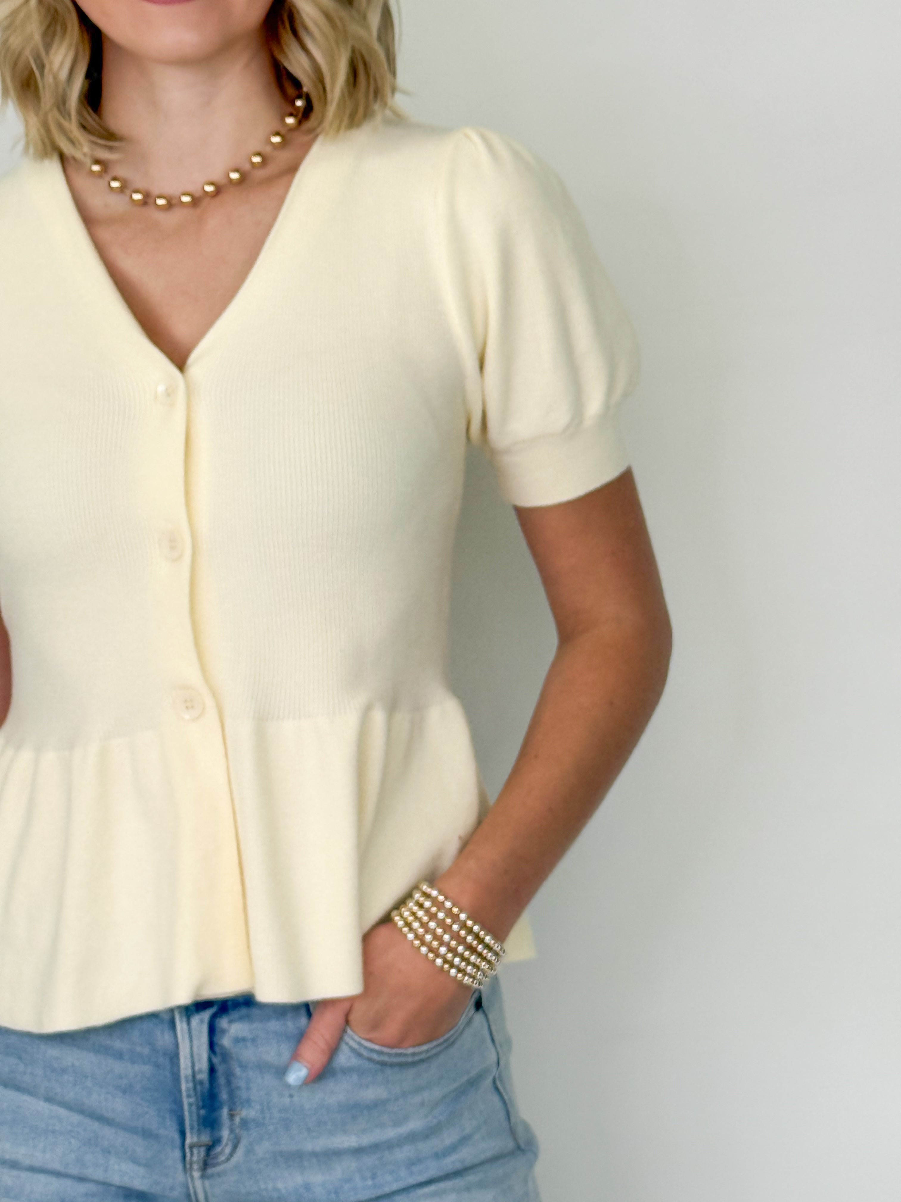 Trinity - V-Neck Short Sleeve Knit Peplum Top (Cream)