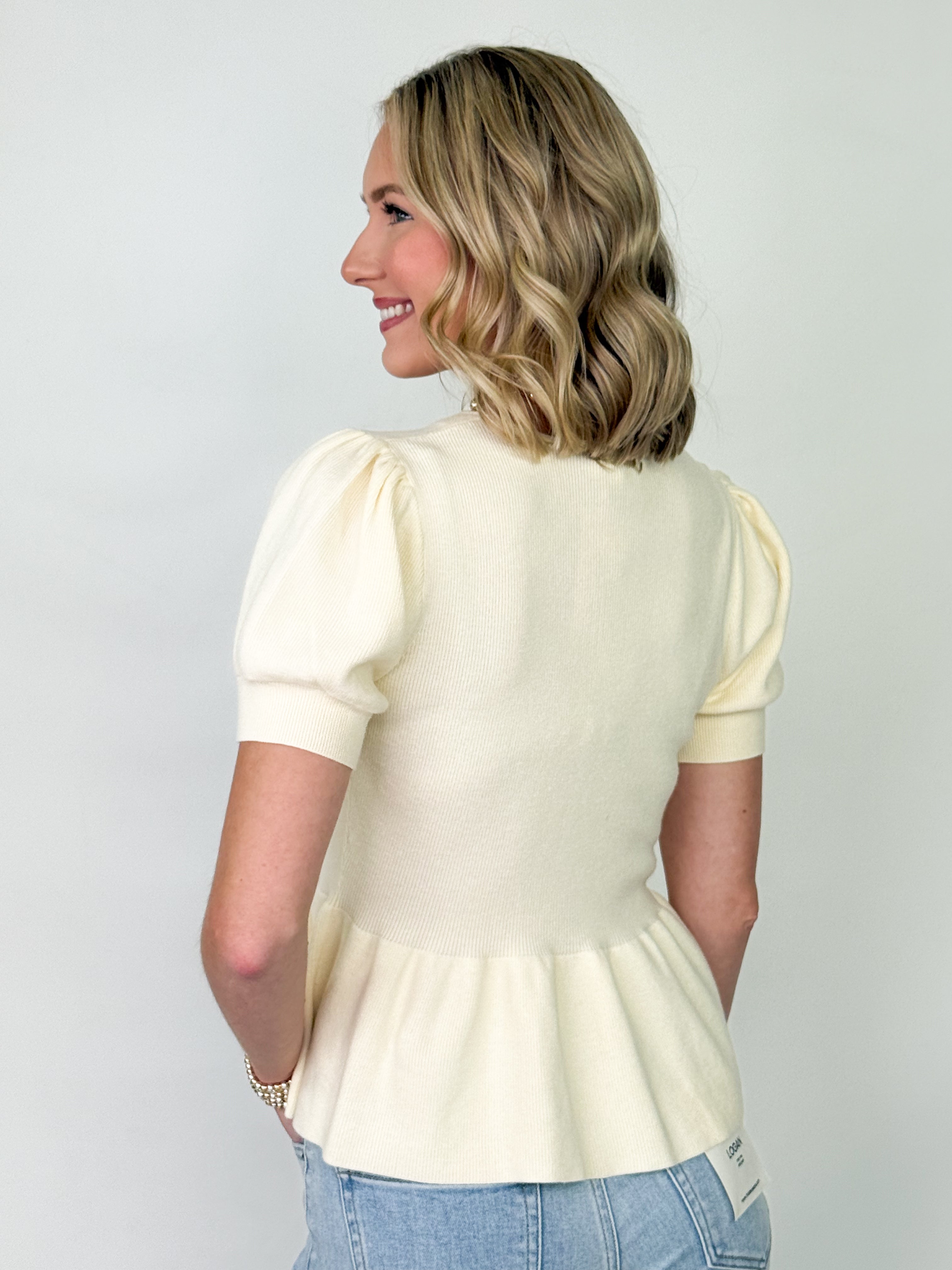 Trinity - V-Neck Short Sleeve Knit Peplum Top (Cream)