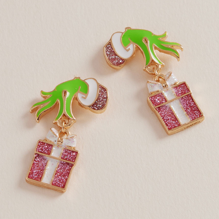 Grinch Hand Holding Pink Present